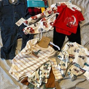 6 months outfits. 2 6-9 months(coveralls/liam&james)Both footie PJs are dbl Zip